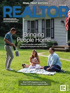 Magazine cover with a family sitting on the grass in front of a house